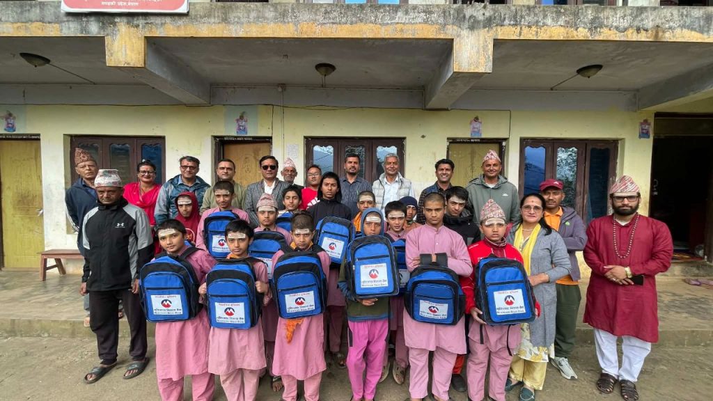 Muktinath Development Bank provides educational materials to 100 students from two schools