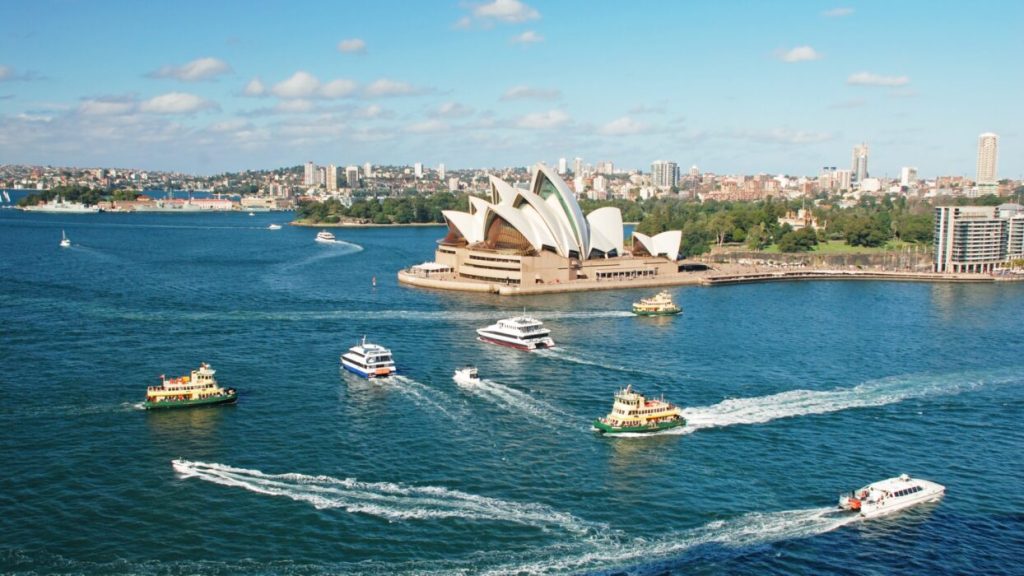 Sydney,Opera,House,With,Ferrys,In,Foregournd,,Taken,From,Harbor